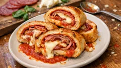 Homemade Stromboli: a crisp, cheesy rolled pizza bread that slices neatly for sharing