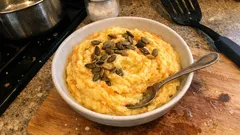 Creamy sweet potato & potato mash with nutmeg and crunchy pumpkin seeds